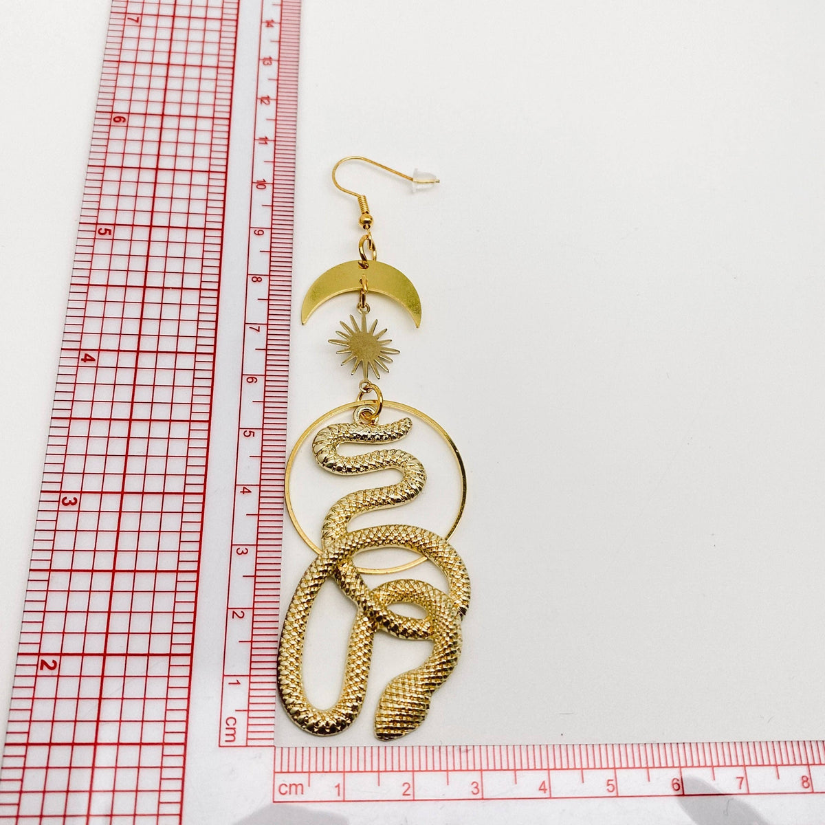 The Serpent’s Orbit Earrings