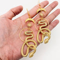 The Serpent’s Orbit Earrings